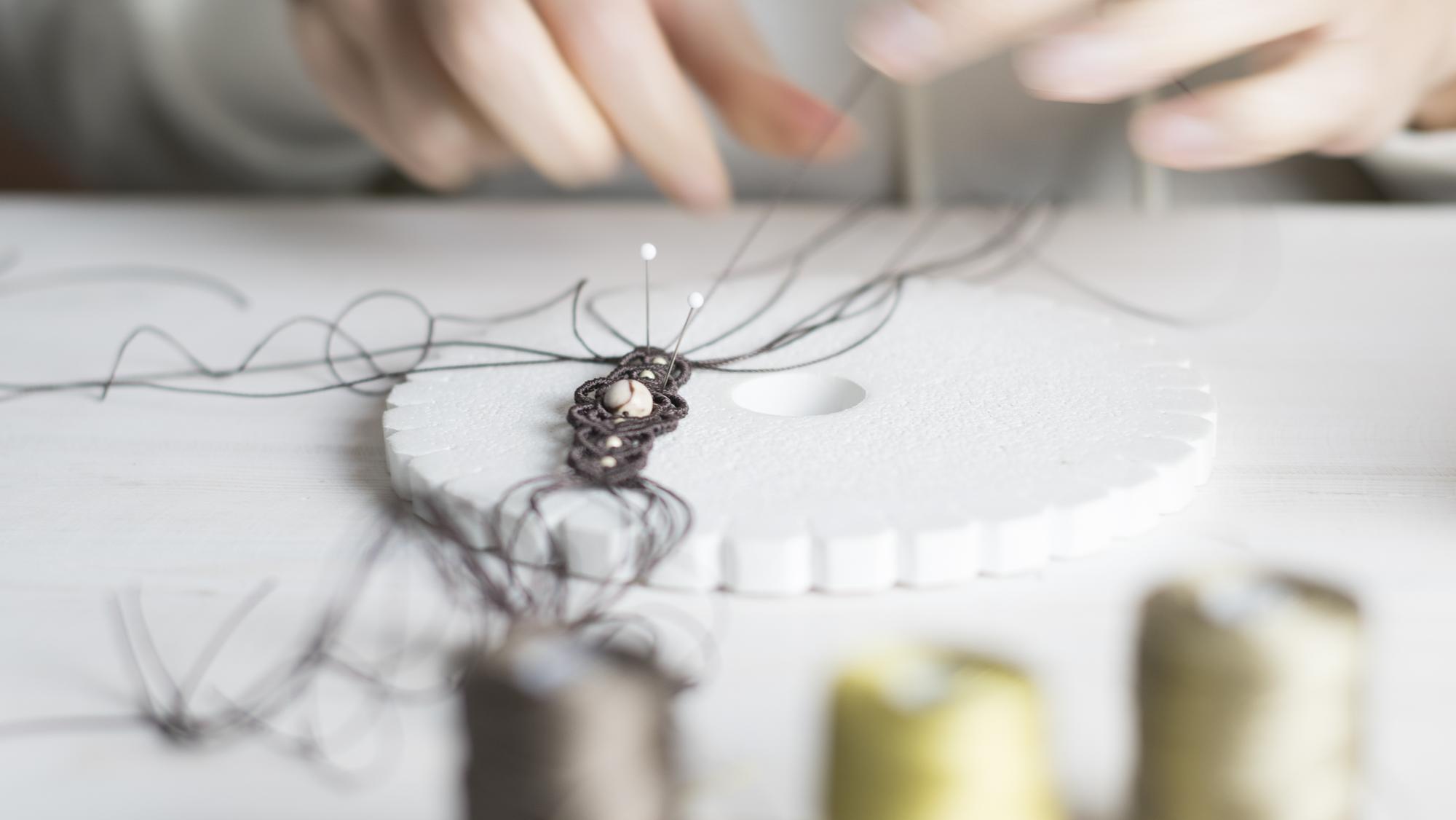 detail of metallic thread embroidery