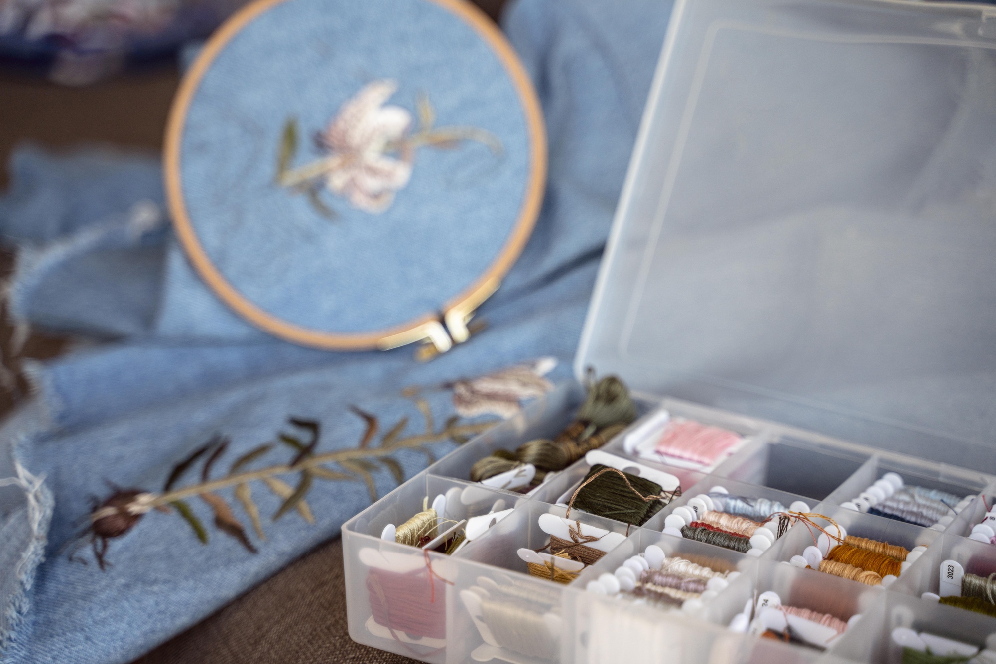 selection of embroidered samples on table